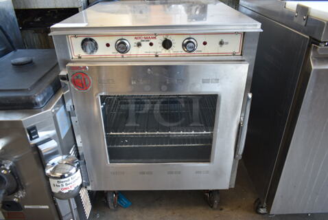 Alto Shaam CH-75/DM Stainless Steel Commercial Heated Holding Cabinet on Commercial Casters. 120/208-240 Volts.