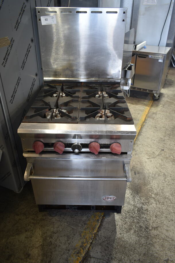Dynamic Cooking Systems DCS Stainless Steel Commercial Gas Powered 4 Burner Range w/ Oven, Back Splash and Removable Cutting Board.  - Image 1 of 7