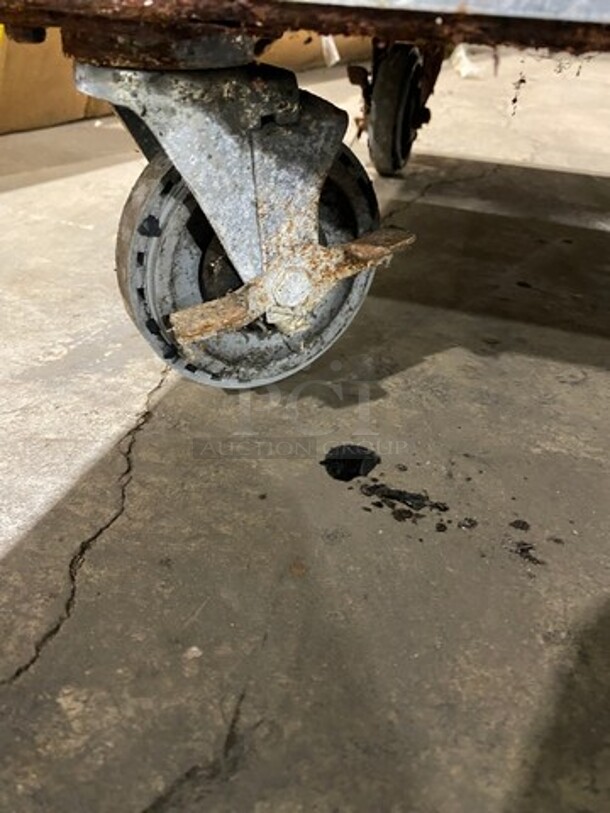 American Range Commercial Natural Gas Powered 10 Burner Stove! With Raised Back Splash And Salamander Shelf! With 2 Full Size Oven Underneath! Metal Oven Racks! All Stainless Steel! On Casters! - Image 9 of 12