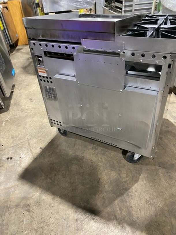 WOW! Vulcan Commercial Natural Gas Powered 2 Burner Stove With Flat Griddle! Flat Griddle Has Back And Side Splashes! With Oven Underneath! All Stainless Steel! On Casters! Model: 36S2B24GN SN: 481883161 - Image 4 of 9