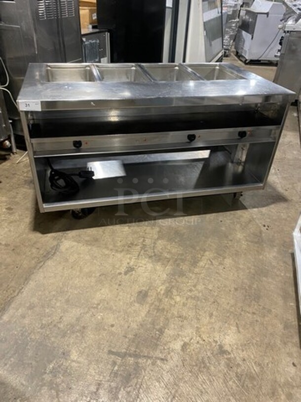 Delfield Manitowoc Commercial Electric Powered 4 Well Steam Table! With Storage Space Underneath! All Stainless Steel! On Casters! Model: F14EI460 SN: 1108150000784 208/230V 60HZ 1 Phase