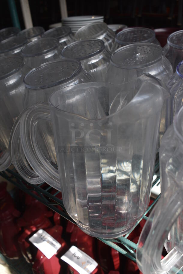 ALL ONE MONEY! Lot of 29 Clear Poly Pitchers! 7x5x8 - Image 1 of 5
