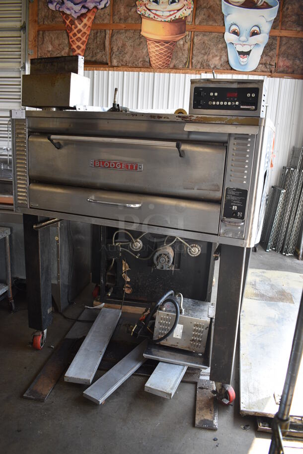 Blodgett Model 1048DD/AA-S Stainless Steel Commercial Natural Gas Powered Single Deck Pizza Oven on Metal Legs w/ Commercial Casters. Comes w/ 2 Cooking Stones. Unit Has An Added Humidity Steam Box Attachment For Donut Baking. 80,000 BTU. 60.5x45.5x72.5 - Image 3 of 12