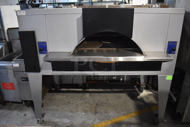 LIKE NEW! Bakers Pride Stainless Steel Commercial Natural Gas Powered Floor Style Il Forno Single Deck Pizza Oven on Metal Legs w/ Commercial Casters. 78x54x68 - Image 2 of 12