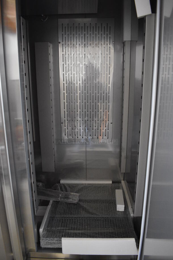 BRAND NEW SCRATCH AND DENT! Avantco Model 178SS2FHC Stainless Steel Commercial Two Door Reach In Freezer w/ Poly Coated Racks on Commercial Casters. 115 Volts, 1 Phase. 54x32x77.5. Tested and Working! - Image 6 of 7