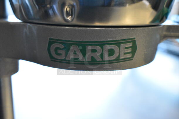 BRAND NEW SCRATCH AND DENT! Garde Metal Countertop Manual Juicer. See Picture for Missing Leg.  - Image 4 of 5