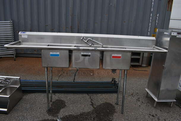 Stainless Steel Commercial 3 Bay Sink w/ Dual Drainboards, Faucet, Handles. 105x24x56. Bay 18x18x12. Drainboards 22x20x1 - Image 1 of 6