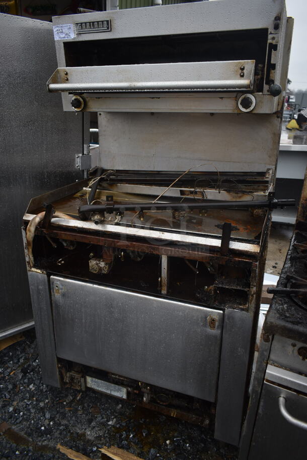Garland Stainless Steel Commercial Natural Gas Powered Flat Top Griddle w/ Salamander Cheese Melter and Oven. 