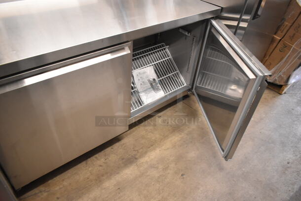 BRAND NEW SCRATCH AND DENT! 2023 Avantco 178SSWT60FHC Stainless Steel Commercial 2 Door Work Top Freezer on Commercial Casters. Right Door Does Not Stay Closed. 115 Volts, 1 Phase. Tested and Working! - Image 4 of 7
