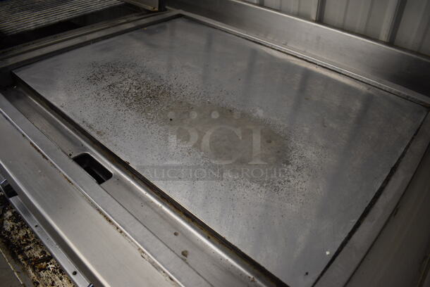 Wells Stainless Steel Commercial Work Station w/ Flat Top Griddle, Charbroiler, Well and Side Under Shelves. Does Not Come w/ Delfield 4 Drawer Chef Base: Goes GREAT w/ Item 246! 115 Volts, 1 Phase Refrigeration. 208-240 Volt, 3 Phase Heating. 114x36x34 - Image 7 of 10