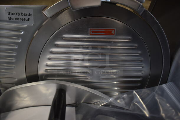 BRAND NEW SCRATCH AND DENT! 2023 Avantco  177SL312 Stainless Steel Commercial Countertop 12" Semi Automatic Meat Slicer w/ Blade Sharpener. 110-120 Volts, 1 Phase. Tested and Working! - Image 5 of 5