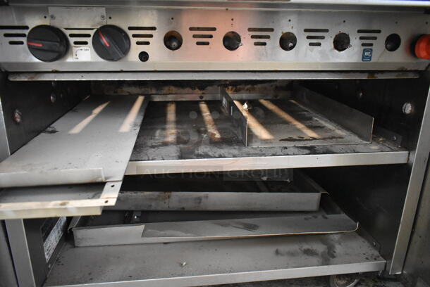 MagiKitch'n FM-636-H Stainless Steel Commercial Natural Gas Powered Charbroiler Grill w/ Under Shelf on Commercial Casters.  - Image 4 of 8