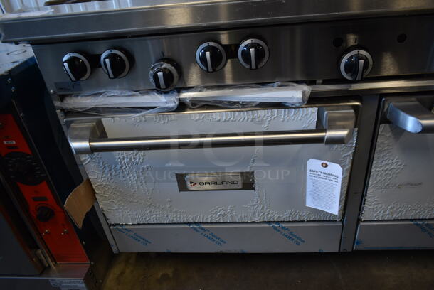 BRAND NEW SCRATCH AND DENT! Garland G60-4G36RR Stainless Steel Commercial Natural Gas Powered 4 Burner Range w/ Flat Top, 2 Ovens, Over Shelf and Back Splash.  - Image 6 of 10