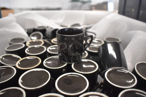 ALL ONE MONEY! Bin of Black Ceramic Mugs. 2.75x2x2
