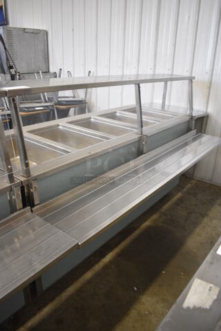 Vollrath 37050-2494-CNB Stainless Steel Commercial Electric Powered 5 Well Steam Table w/ Sneeze Guard and Tray Slide on Commercial Casters. 208 Volts, 1 Phase. 92x45x48