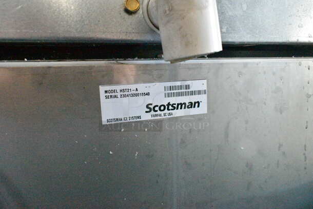 BRAND NEW SCRATCH AND DENT! 2024 Scotsman HID540AB-1A Meridian 21 1/4" Air Cooled Nugget Ice Machine with 40 lb. Bin, Push Button Ice and Water Dispensing, and Cabinet Stand. 500 lb. 115 Volts, 1 Phase.  - Image 9 of 10