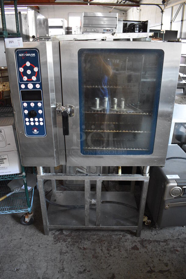 Alto Shaam Model 10.10 MI Stainless Steel Commercial Electric Powered Combitherm Convection Oven w/ View Through Door and Metal Oven Racks on Metal Stand. 208-240 Volts, 3 Phase. 40x30x66