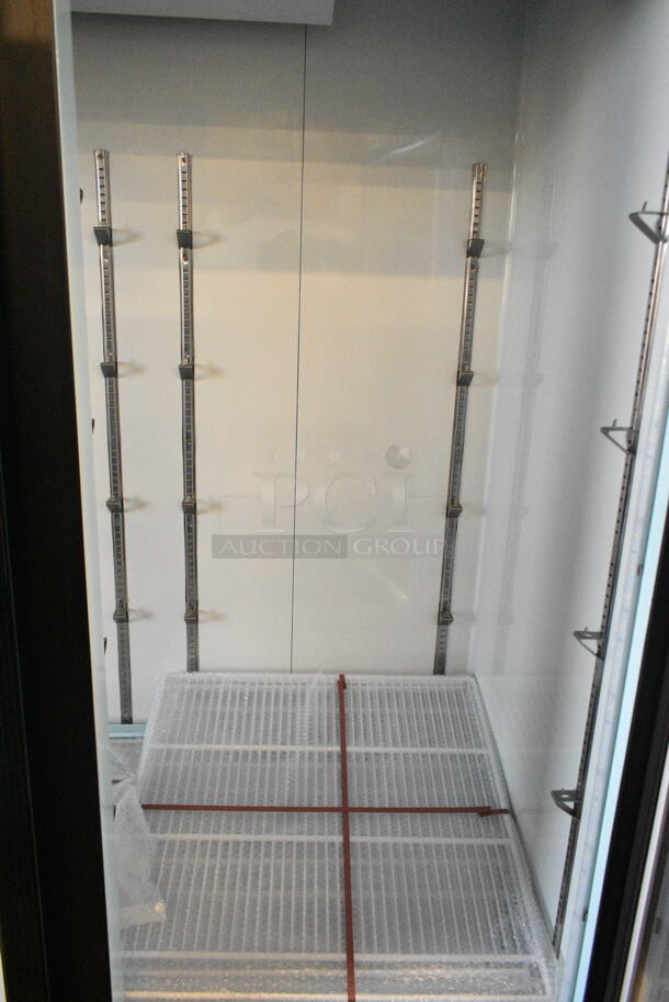 BRAND NEW SCRATCH AND DENT! 2024 Avantco 178GDC69HCB 78 1/4" Black Customizable Swing Glass Door Merchandiser Refrigerator with LED Lighting. See Pictures for Broken Glass. 115 Volts, 1 Phase. Tested and Working! - Image 7 of 8