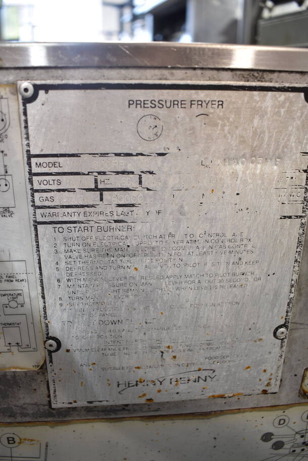 Henny Penny 600RB Stainless Steel Commercial Floor Style Natural Gas Powered Pressure Fryer w/ Metal Fry Basket on Commercial Casters. 80,000 BTU.  - Image 10 of 10