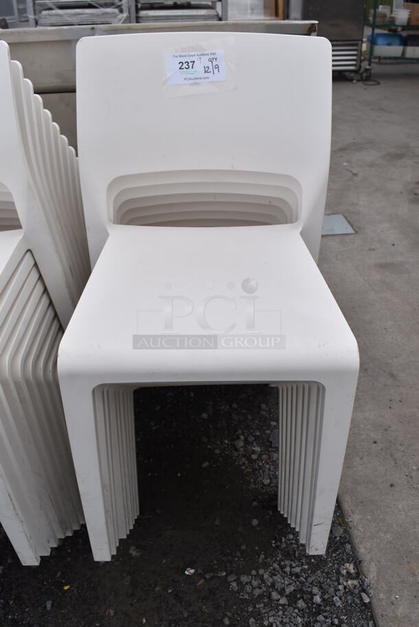 9 White Poly Dining Chairs. 17.5x18x31. 9 Times Your Bid!