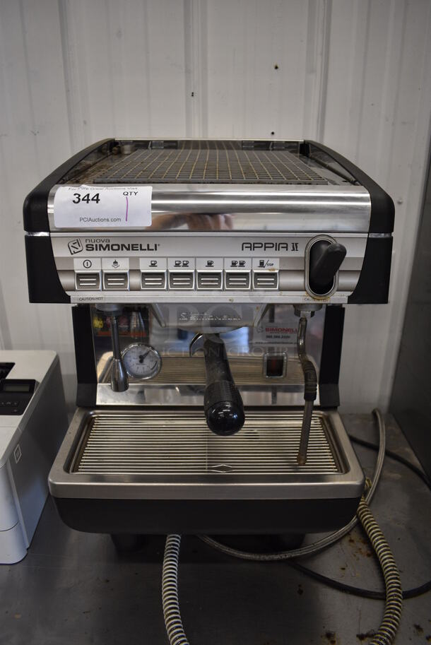 2014 Nuova Simonelli Model APPIA II V GR1 Stainless Steel Commercial Countertop Single Group Espresso Machine w/ Portafilter and Steam Wand. 110-120 Volts, 1 Phase. 16x22x25