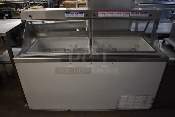 Baskin Robbins Stainless Steel Commercial Floor Style Ice Cream Dipping Cabinet w/ 3 Metal Tub Collars. 68.5x30x52. Tested and Powers On But Does Not Get Cold - Image 1 of 7