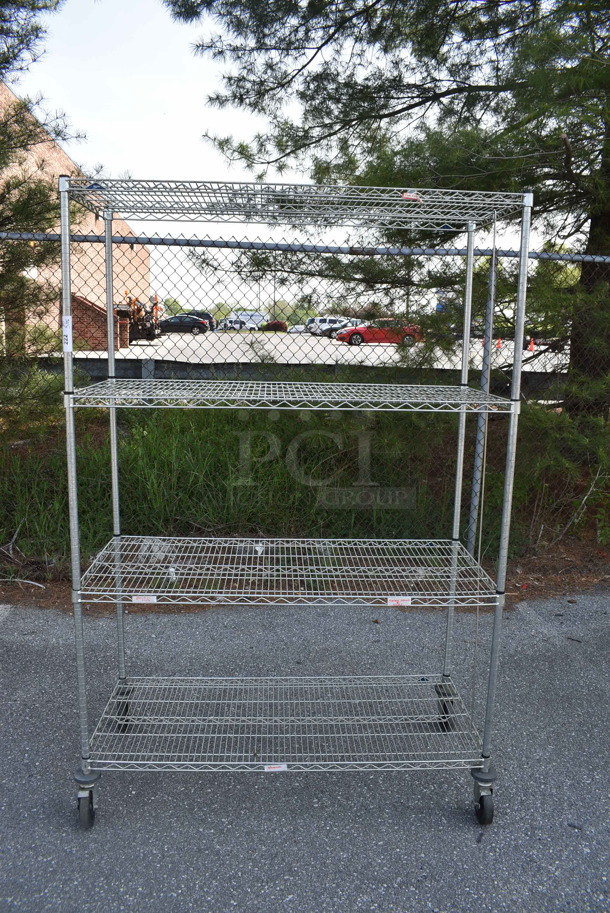 Steel Metro Style Shelving Unit With 4 Shelves on Commercial Casters. BUYER MUST DISMANTLE. PCI CANNOT DISMANTLE FOR SHIPPING. PLEASE CONSIDER FREIGHT CHARGES.
