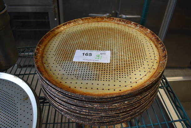 31 Metal Round Perforated Pizza Baking Pans. 15x15x1. 31 Times Your Bid!