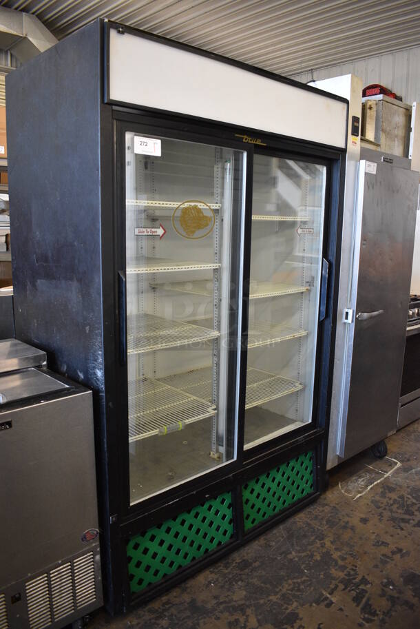 True Model GDM-45 Metal Commercial 2 Door Reach In Cooler Merchandiser w/ Poly Coated Racks. 115 Volts, 1 Phase. 51x30x79. Tested and Powers On But Does Not Get Cold