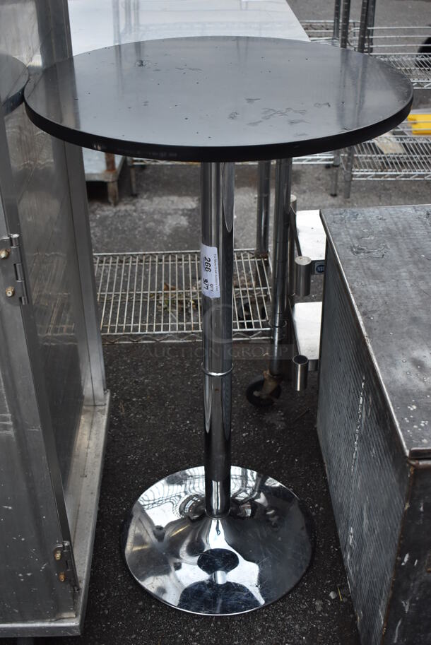 Black Round Bar Height Table on Chrome Finish Base. 24x24x41