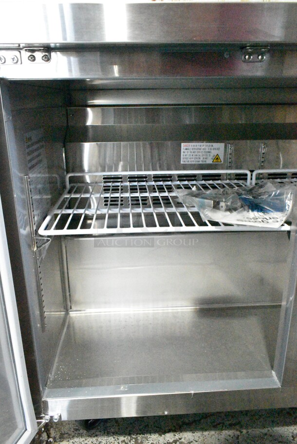 BRAND NEW SCRATCH AND DENT! 2024 Avantco 178SSWT48RHC Stainless Steel 48" Two Door Worktop Refrigerator with 3 1/2" Backsplash on Commercial Casters. 115 Volts, 1 Phase. Tested and Working! - Image 6 of 8