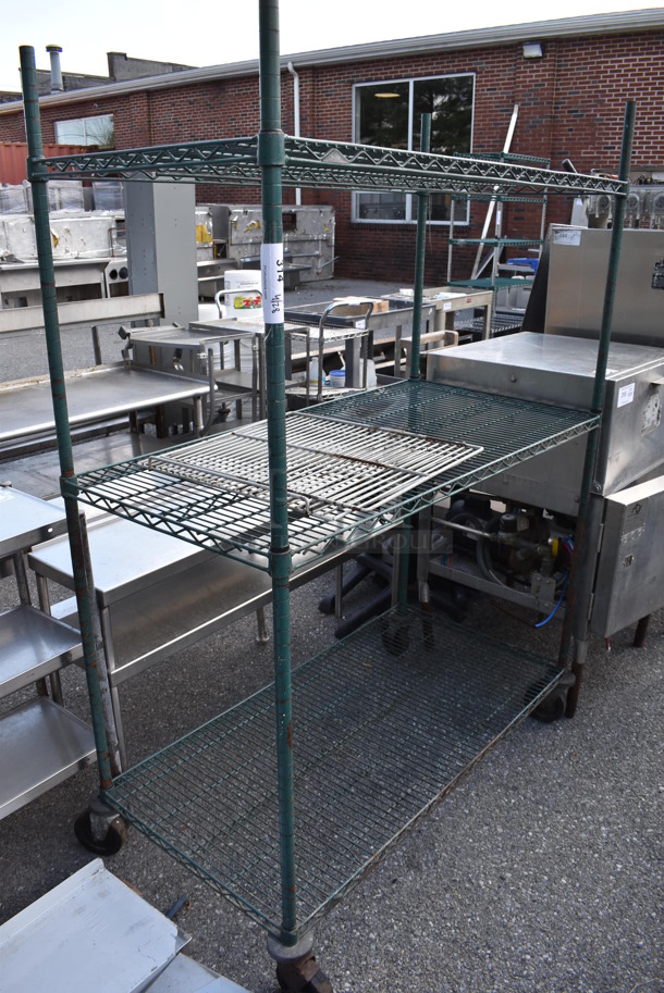 Green Finish 3 Tier Wire Shelving Unit on Commercial Casters. BUYER MUST DISMANTLE. PCI CANNOT DISMANTLE FOR SHIPPING. PLEASE CONSIDER FREIGHT CHARGES.
 - Image 1 of 3