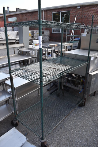 Green Finish 3 Tier Wire Shelving Unit on Commercial Casters. BUYER MUST DISMANTLE. PCI CANNOT DISMANTLE FOR SHIPPING. PLEASE CONSIDER FREIGHT CHARGES.
