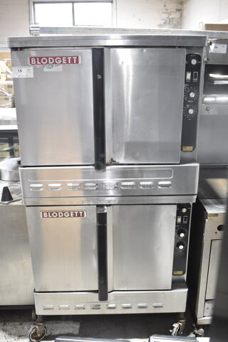 2 Blodgett Stainless Steel Commercial Natural Gas Powered Full Size Convection Oven w/ Solid Doors, Metal Oven Racks and Thermostatic Controls on Commercial Casters. 2 Times Your Bid!