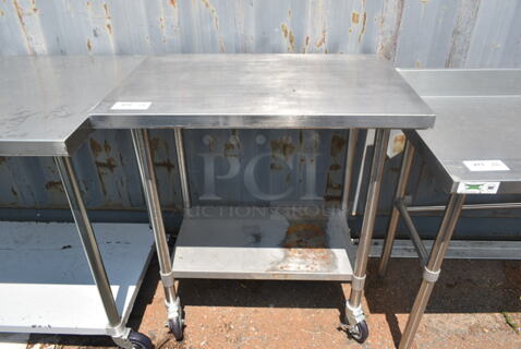 Regency Stainless Steel Table w/ Metal Under Shelf on Commercial Casters.