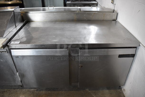 Continental SW60 Stainless Steel Commercial 2 Door Work Top Cooler on Commercial Casters. 115 Volts, 1 Phase. 60x30x35. Tested and Working!