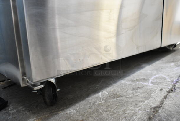 BRAND NEW SCRATCH AND DENT! 2023 Avantco 178SSPT60MHC  60" 2 Door Mega Top Stainless Steel Refrigerated Sandwich Prep Table on Commercial Casters. 115 Volts, 1 Phase. Tested and Working! - Image 4 of 9