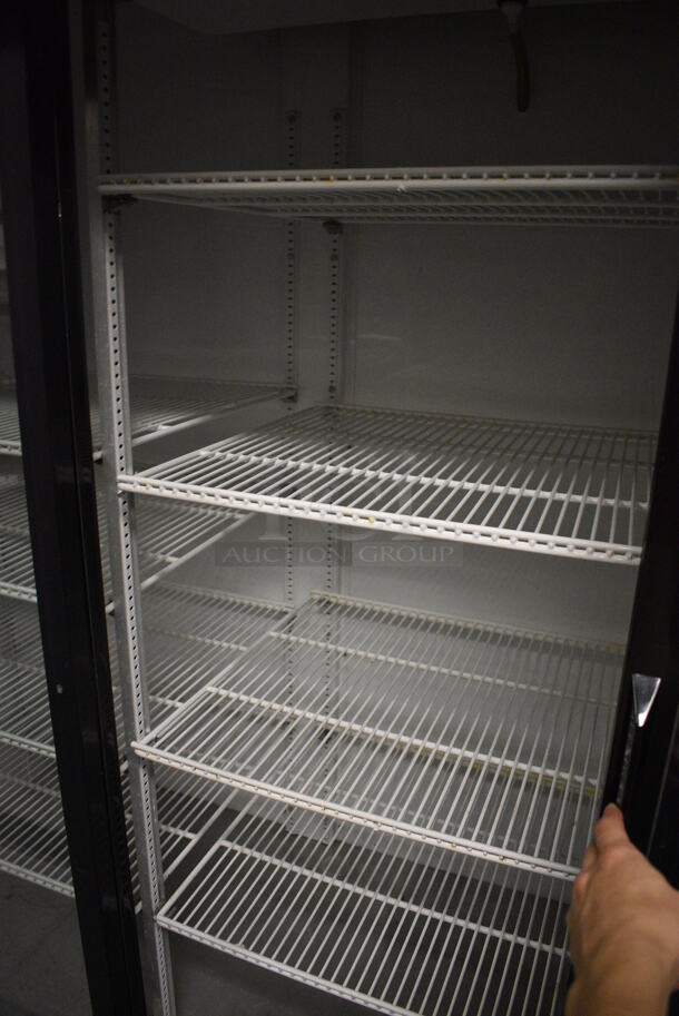2014 True GDM-69-LD ENERGY STAR Metal Commercial 3 Door Reach In Cooler Merchandiser w/ Poly Coated Racks. 115 Volts, 1 Phase. 78.5x30x78.5. Item Was in Working Condition on Last Day of Business. (kitchen) - Image 4 of 7
