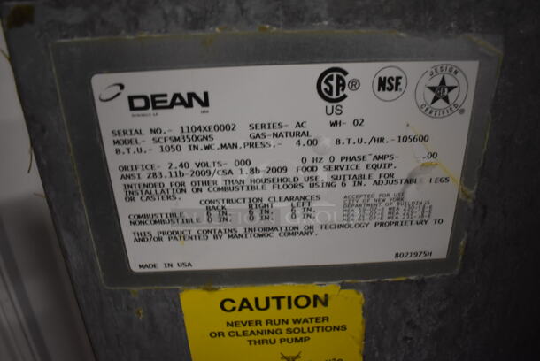 2011 Dean SCFSM350GNS Stainless Steel Commercial Floor Style Natural Gas Powered 3 Bay Deep Fat Fryer w/ 6 Metal Fry Baskets and Filtration System on Commercial Casters. 105,600 BTU. 47x30x51 - Image 9 of 11