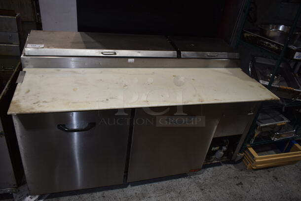 Torrey Stainless Steel Commercial Pizza Prep Table w/ Oversized Cutting Board. Tested and Powers On But Does Not Get Cold  - Image 1 of 9