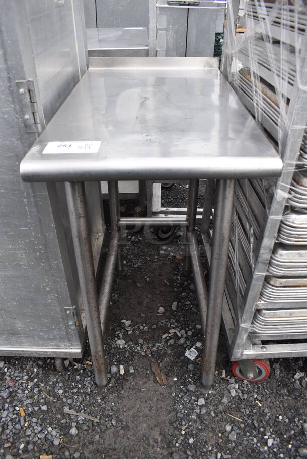 Stainless Steel Table w/ Back Splash. 18x30.5x36