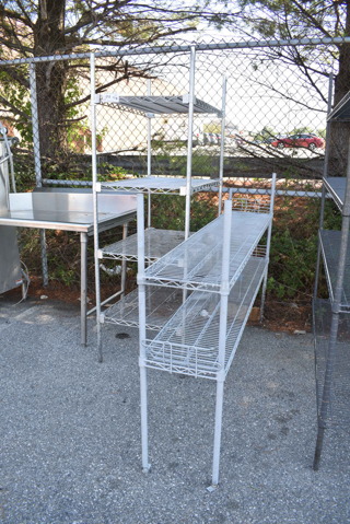 2 Wire Shelving Units; 2 Tier and 4 Tier. BUYER MUST DISMANTLE. PCI CANNOT DISMANTLE FOR SHIPPING. PLEASE CONSIDER FREIGHT CHARGES. 74x14x48, 34x24x75. 2 Times Your Bid! 