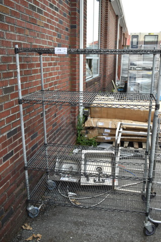 Chrome and Black Finish 4 Tier Wire Shelving Unit on Commercial Casters. BUYER MUST DISMANTLE. PCI CANNOT DISMANTLE FOR SHIPPING. PLEASE CONSIDER FREIGHT CHARGES.