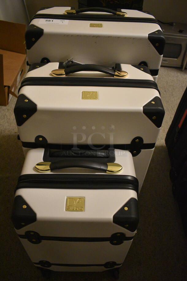 3 Piece Diane von Furstenberg White and Black Hard Shell Roller Luggage Set! 3 Times Your Bid!