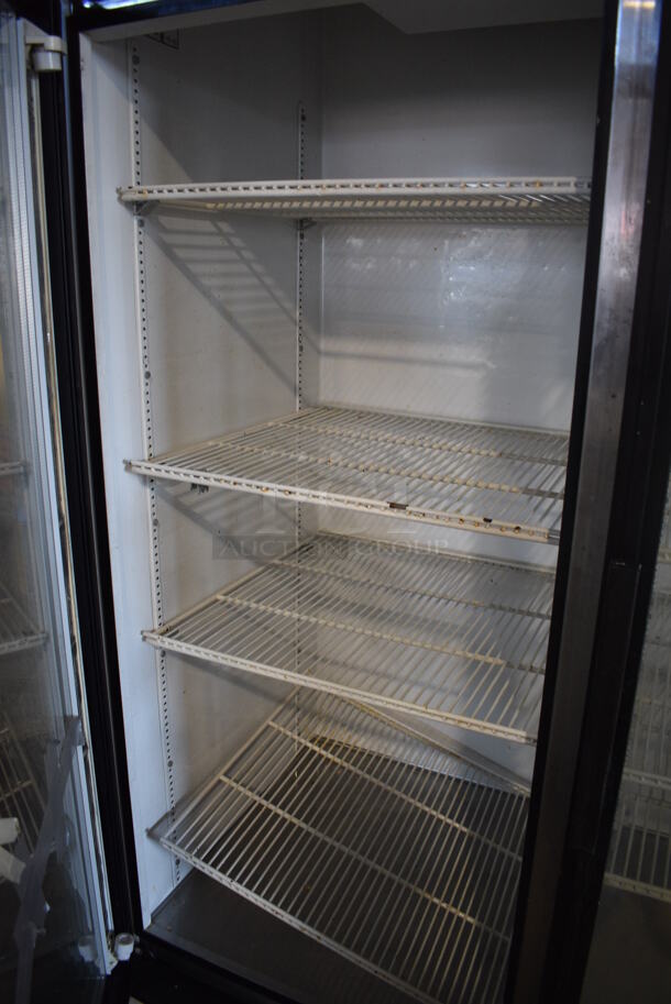 True Model GDM-49 Metal Commercial 2 Door Reach In Cooler Merchandiser w/ Poly Coated Racks. 115 Volts, 1 Phase. 54x31x78. Tested and Working! - Image 4 of 6