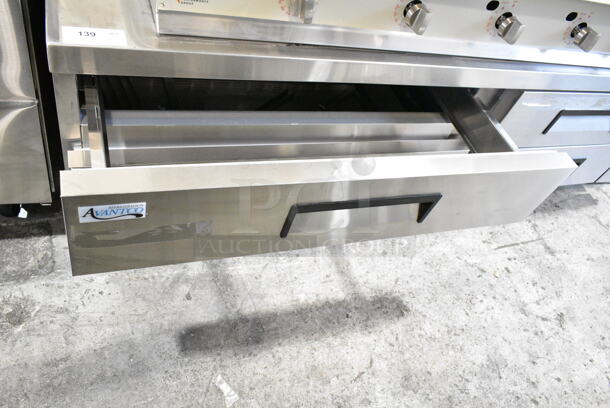 BRAND NEW SCRATCH AND DENT! 2024 Avantco 178CBE84HC Stainless Steel Commercial 4 Drawer Chef Base on Commercial Casters. 115 Volts, 1 Phase. Tested and Working! - Image 4 of 9