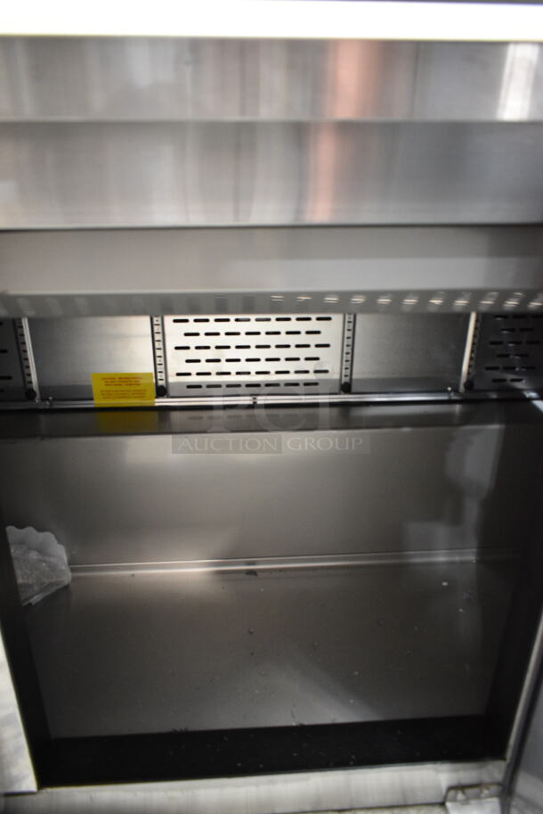 BRAND NEW SCRATCH AND DENT! 2023 Avantco 447APST72 Stainless Steel Commercial Sandwich Salad Prep Table Bain Marie Mega Top on Commercial Casters. 115 Volts, 1 Phase. Tested and Working! - Image 6 of 10