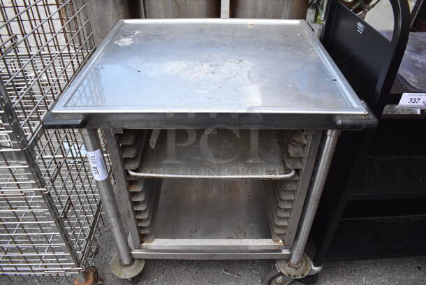 Stainless Steel Table w/ Pan Rack on Commercial Casters.