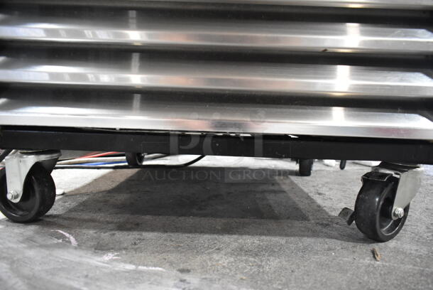 True T-23FG Stainless Steel Commercial Single Door Reach In Cooler Merchandiser w/ Poly Coated Racks on Commercial Casters. 115 Volts, 1 Phase. Tested and Powers On But Does Not Get Cold - Image 2 of 4