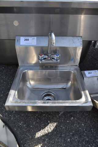 Stainless Steel Commercial Single Bay Wall Mount Sink w/ Faucet and Handles.